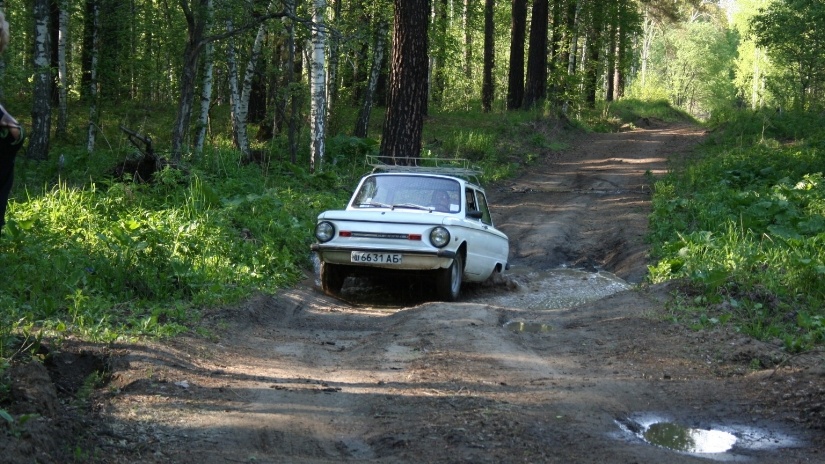 small car on dirt road-146663-edited.jpg